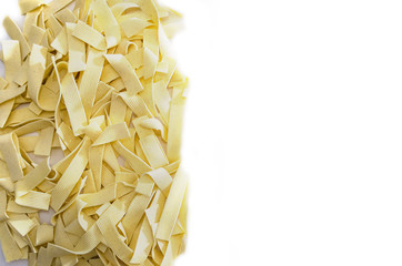pasta with durum wheat on a white background. Place for text.