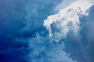 Fototapeta na wymiar Clouds before the storm. Blue sky with huge clouds