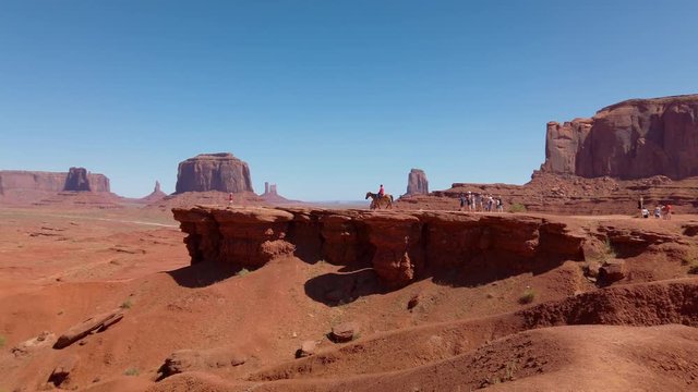 John Ford Point in Oljato Monument Valley, region of Colorado Plateau characterized by cluster of vast sandstone buttes, Arizona&ndash;Utah border. Gimbal panning cinematic Rec.709 ProRes 422 4K
