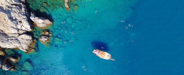 Fototapeta na wymiar Aerial drone ultra wide photo of famous paradise rocky bay and beach of Anthony Quinn in Rodos island, Dodecanese, Greece