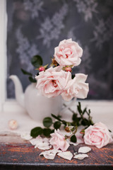 Beautiful flowers from   garden on   windowsill.