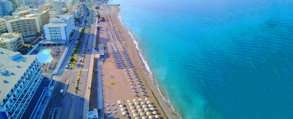 Aerial drone ultra wide top down photo of popular crowded Elli beach in main peninsula of Rodos...