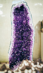 Natural amethyst kimberlite pipe. Purple amethyst crystals, close-up. Exhibit of the Mineralogical...