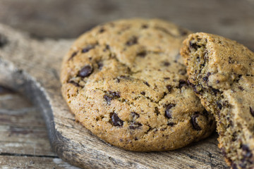 Freshly Baked Chocolate Cookies on a Cutting Board. Sweet Biscuits. Homemade pastry.