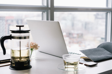 Working on laptop at table