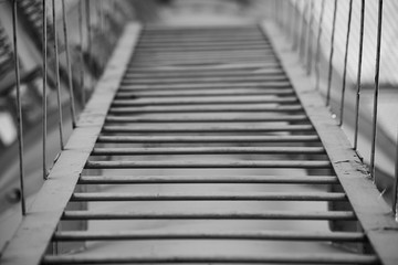Fototapeta premium Monochrome metal staircase, soft focus