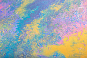 Fototapeta na wymiar Abstract color background from liquid paints close-up