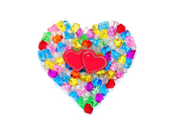 Heart shape made of colored transparent stones