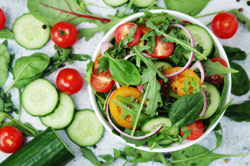 A bowl full of vegetable salad	