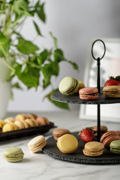 Two Tier Cake Stand With Tasty French Macarons. Still Life.