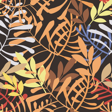 Vector image of colorful leaves and twigs in the jungle on a dark background. Seamless pattern for wallpaper, textile and wrappers. © tinkerfrost