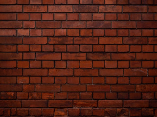 Old grunge red brick wall, abstract vintage background texture.