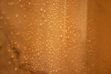 abstract orange background with water drops