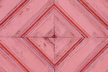 Obraz premium old wooden door. background red. close-up