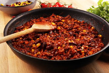 Hot chili con carne. mexican food tasty and spicy wit beans