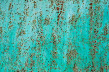 rusty metal texture and turquoise paint close up