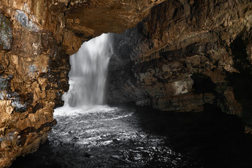 Fototapeta na wymiar Smoo cave at the coast of Scotland