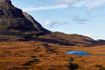 Highway leading through the Scottish highlands.