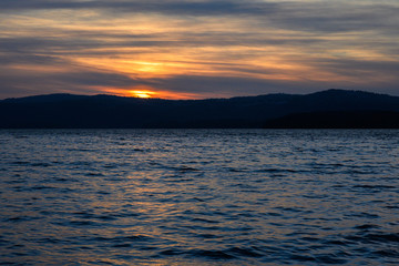 Sunset over the water