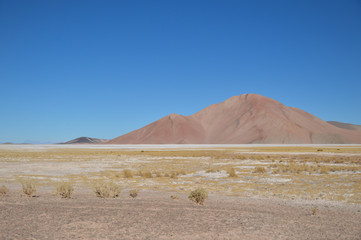 Mountain peak with a perfect blue sky background, located in the arid level plain of Puna highlands, Argentina
