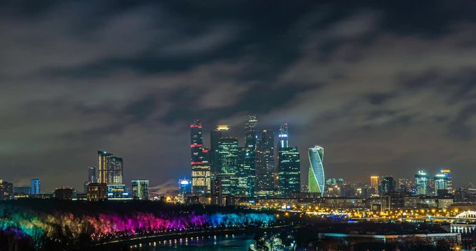 Evening Moscow, time lapse, fast flying clouds in the night sky over Moscow, 4k, beautiful evening cityscape, view from Vorobyovy Gory