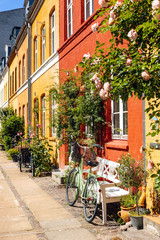 Fototapeta na wymiar Colorful facades of old houses. Old city street