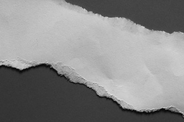 ripped paper isolated on black background with copy space for text
