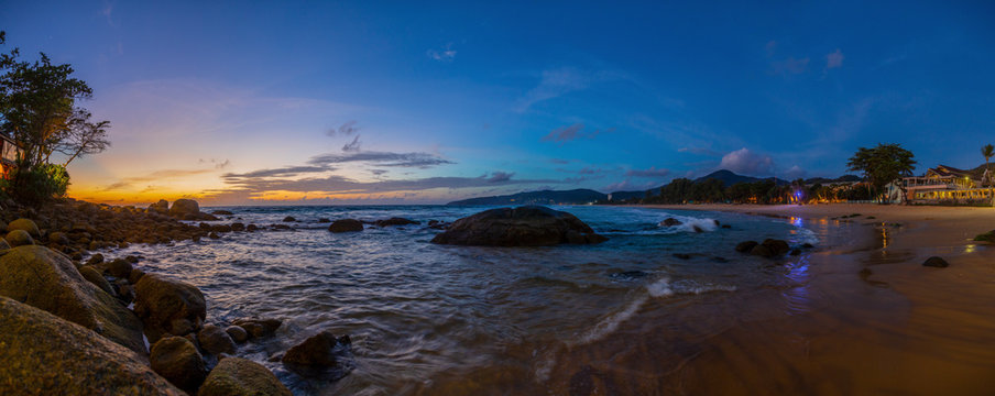 Panoramic picture of empty Kamala beach on Phuket in Thailand during sunset in summer