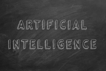 Obraz premium Hand drawing text Artificial intelligence on blackboard.