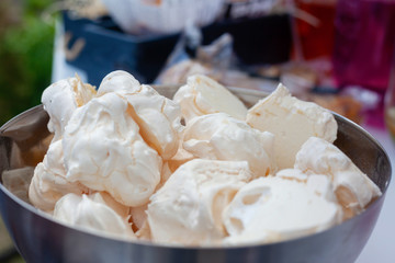 French meringue cookies on metal bowl