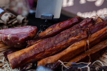 Meat smoked jerky close up. Street food market