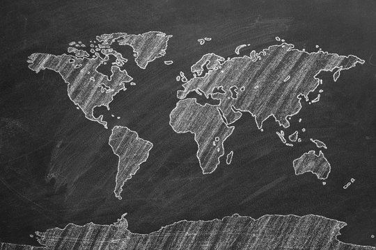 World map hand drawn chalk. Sketch on a blackboard.