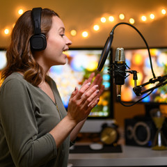 Reading a radio host or blogger text in a home studio into a microphone, radio or broadcast....