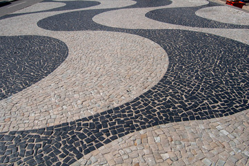Fototapeta premium sidewalk texture of copacabana waterfront in portuguese stone