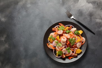 Refreshing dish of fish in citrus juice. Peruvian shrimp, prawn Ceviche marinated in oranges and lime. Diet and healthy food concept. Seafood salad