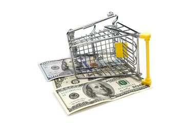 Closeup of a shopping cart full of euro banknotes isolated on white. concept: loan, investment, pension, saving money, financing, collateral, debt, mortgage, financial crisis or rise