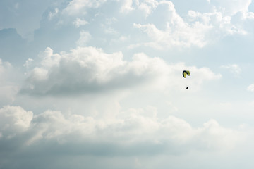 colorful paragliding over blue sky