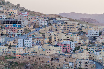 Obraz premium Buildings of Wadi Musa, town located near the archaeological site Petra, Jordan