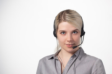 Portrait of attractive business woman with headset isolated over white background with large area...