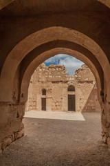 Fototapeta premium Ruins of Qasr Kharana (sometimes Harrana, al-Kharanah, Kharaneh or Hraneh), desert castle in eastern Jordan