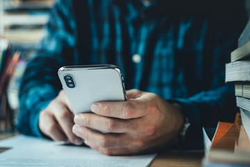 contact marketing businessman professional people thinking while working writing information documents in home offices at desk with computer,laptop,cell phone,business report chart