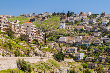 Fototapeta na wymiar Houses on a slope in Salt town, Jordan