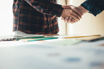 handshake business partners agree to contract Real Estate Venture International trade,contract investment in meetings vision to invest for profit