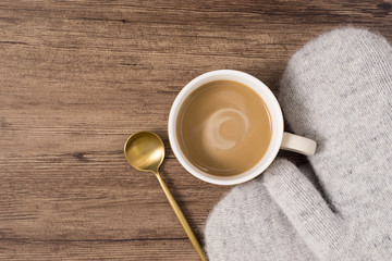 Tilting angle, coffee on wooden table top