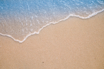 Naklejka na ściany i meble Soft wave on sandy beach. Background.