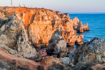 Rocky cliffs and a lighthouse at Ponta da Piedade near Lagos, Portugal