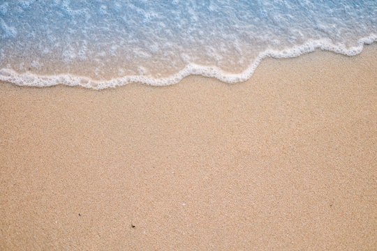 Soft wave on sandy beach. Background. © Hide_Studio