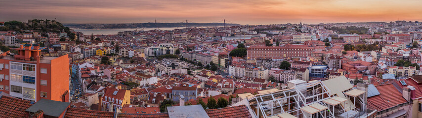 Panorama of evening Lisbon from Miradouro da Graca viewpoint, Portugal