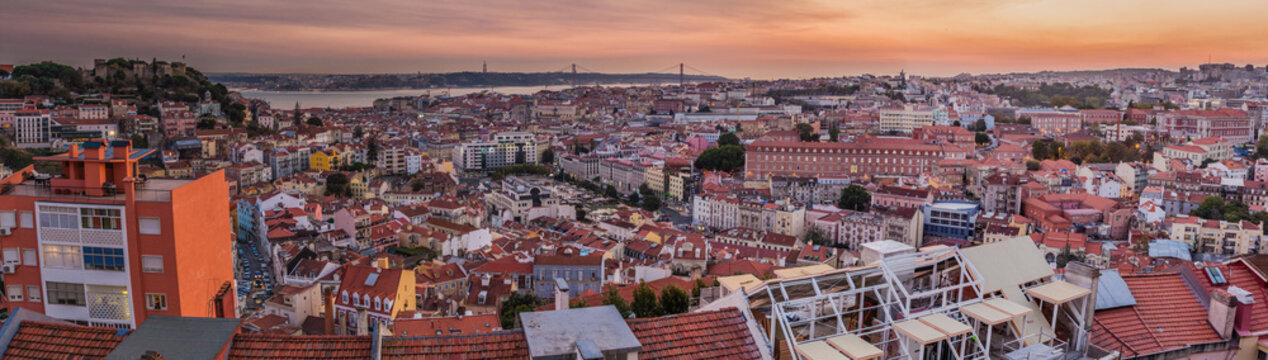 Panorama of evening Lisbon from Miradouro da Graca viewpoint, Portugal