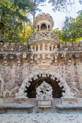 Stone tower in Quinta da Regaleira complex in Sintra, Portugal